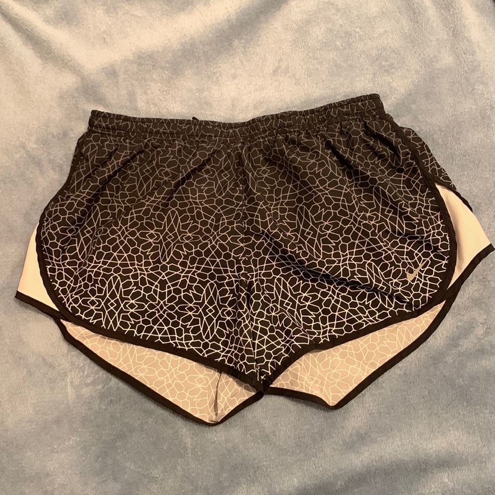 Black and white Nike running shorts